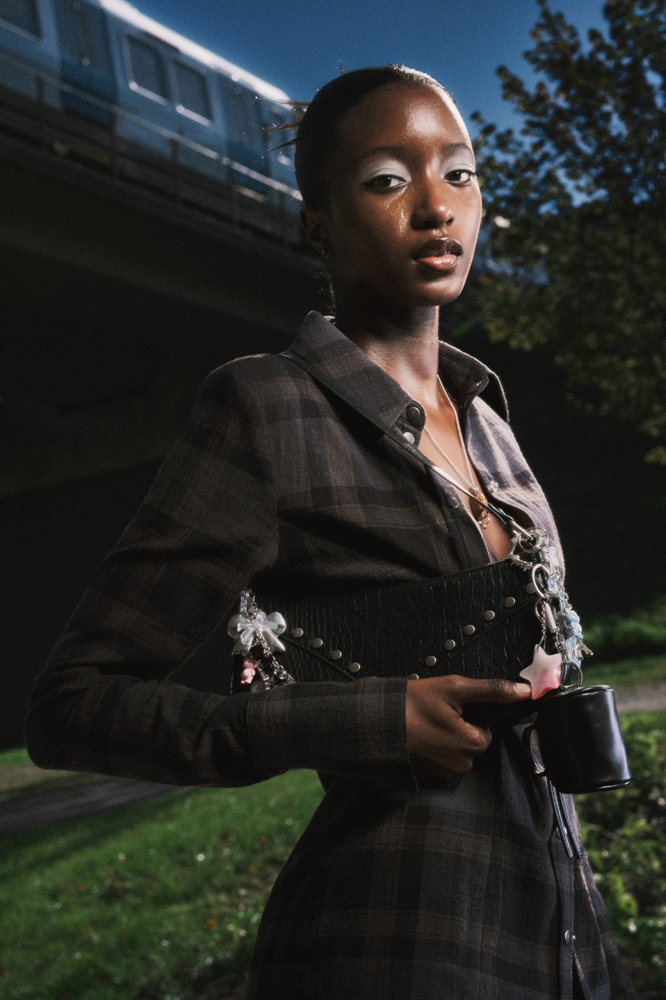 A woman wearing an outfit from Weekday Summer 2025 collection