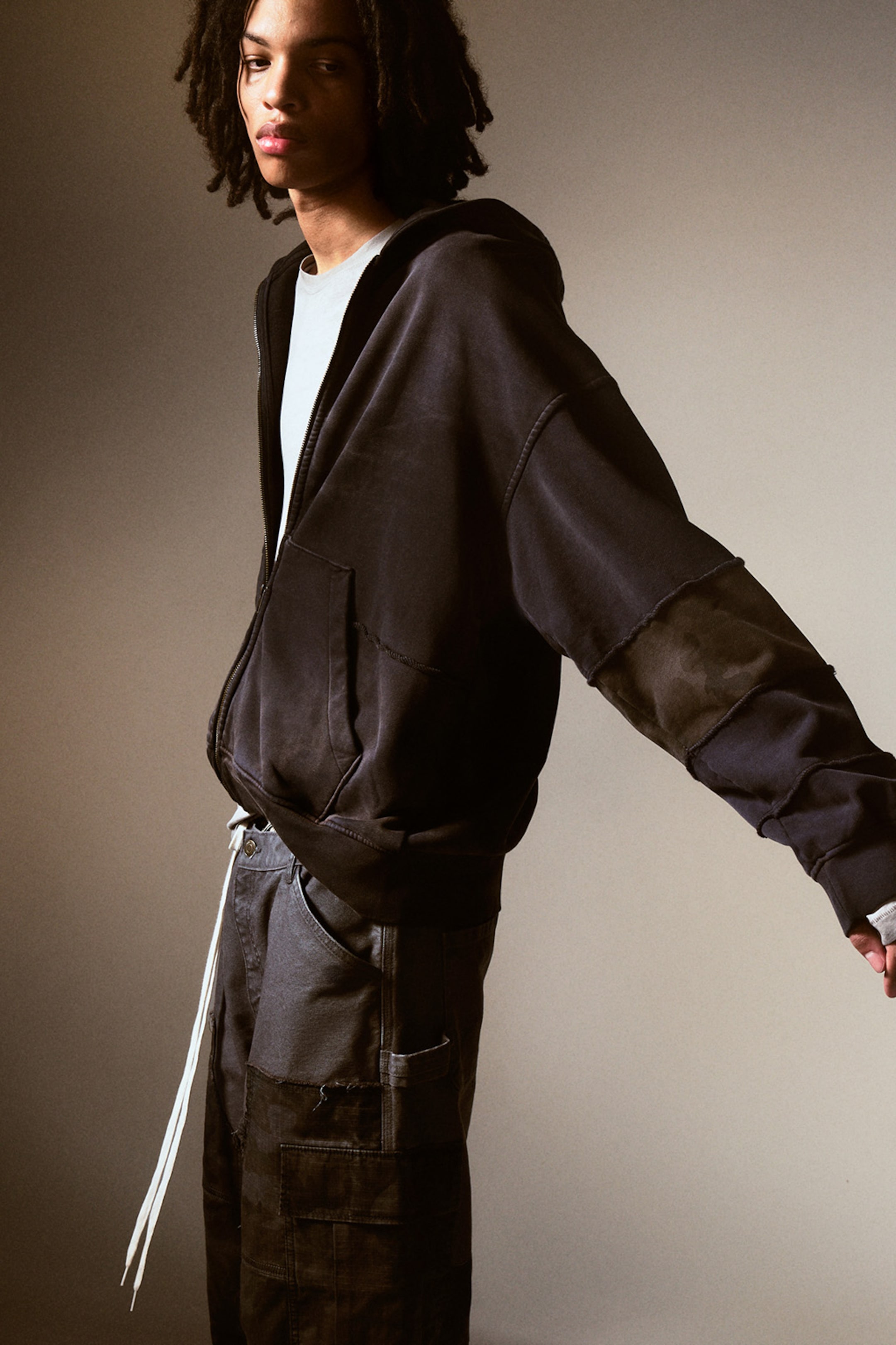 A model wearing clothing from the Weekday 2025 fall collection