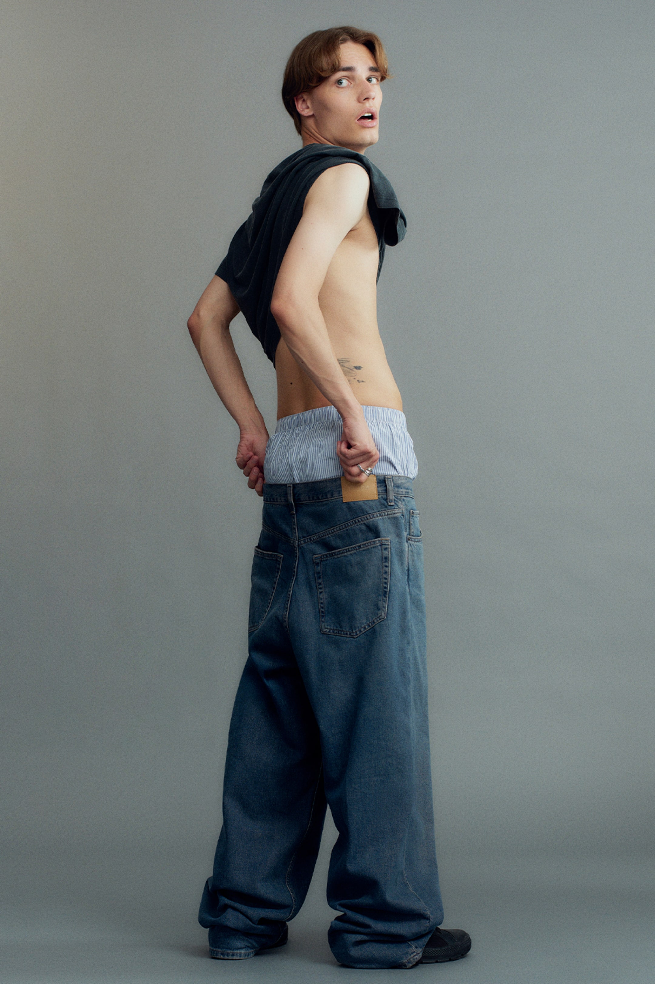 A model wearing clothing from the Weekday 2025 collection
