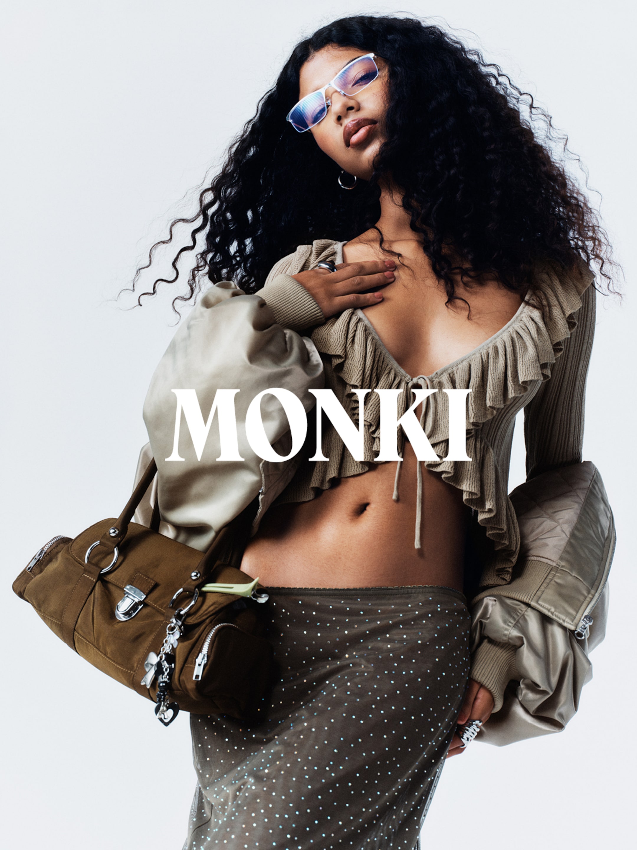 A woman wearing an outfit from Monki collection