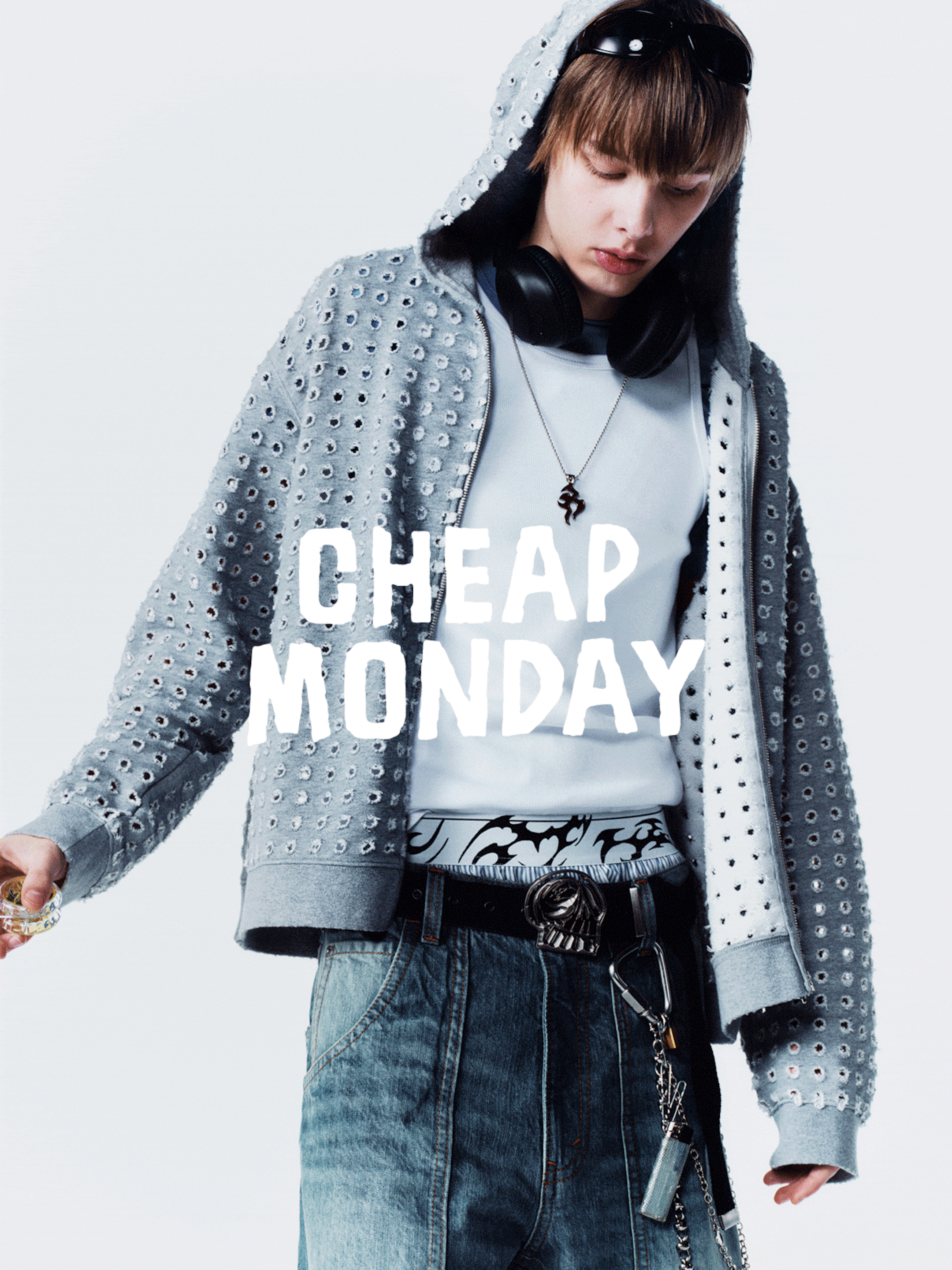 Women and men wearing outfits from Cheap Monday collection