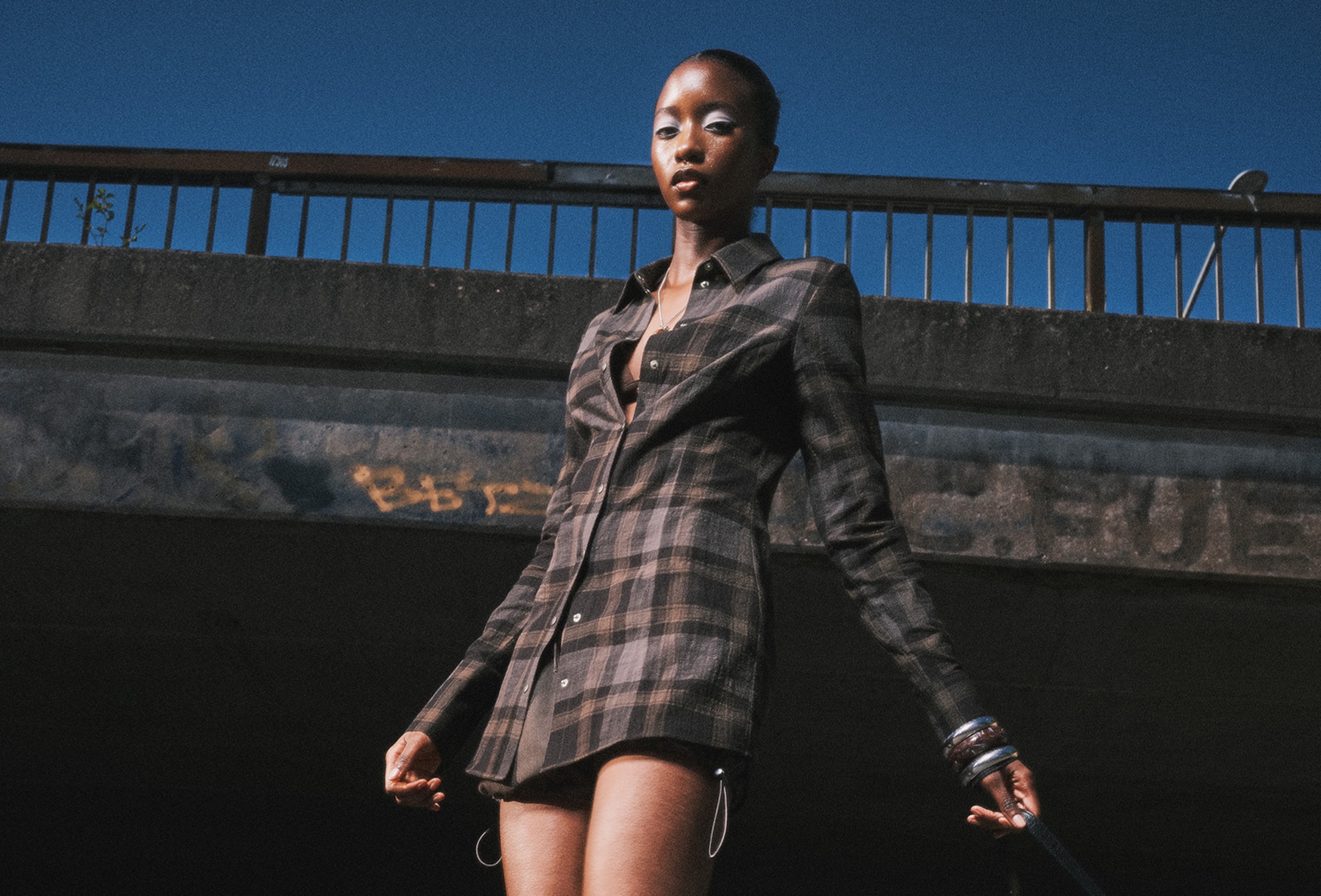 A woman wearing an outfit from Weekday Summer 2025 collection