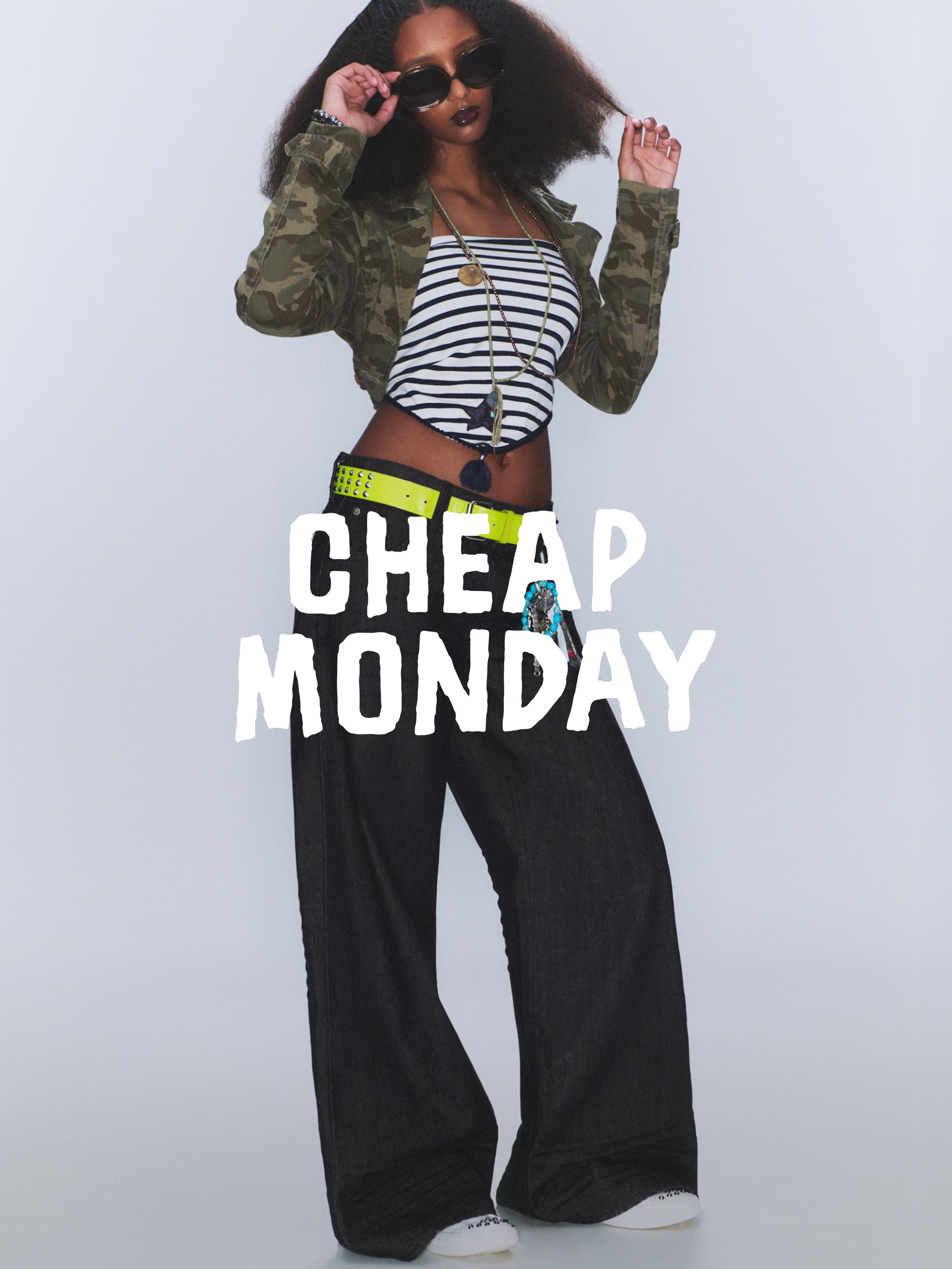 A woman wearing an outfit from Cheap Monday collection