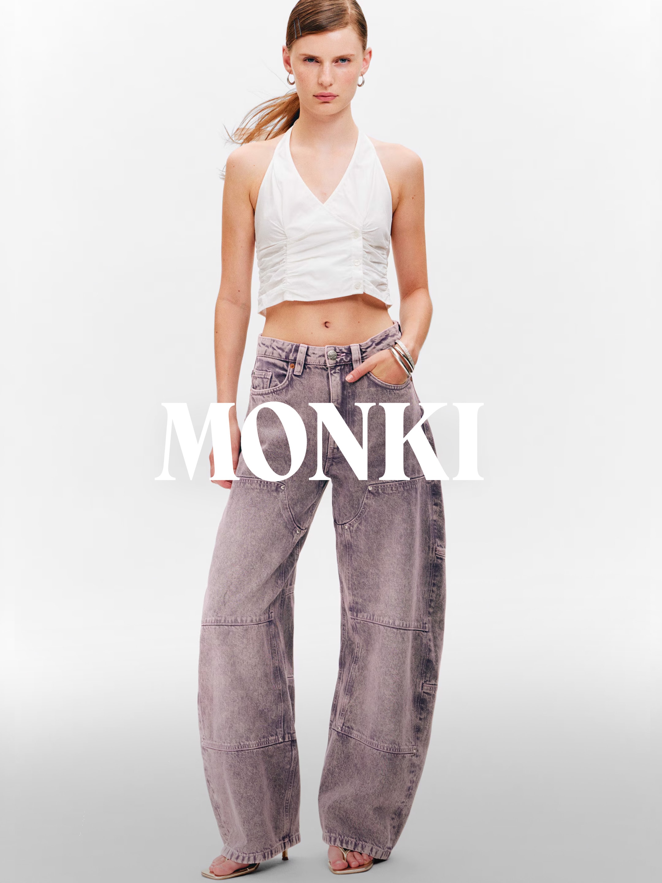 A woman wearing an outfit from Monki collection