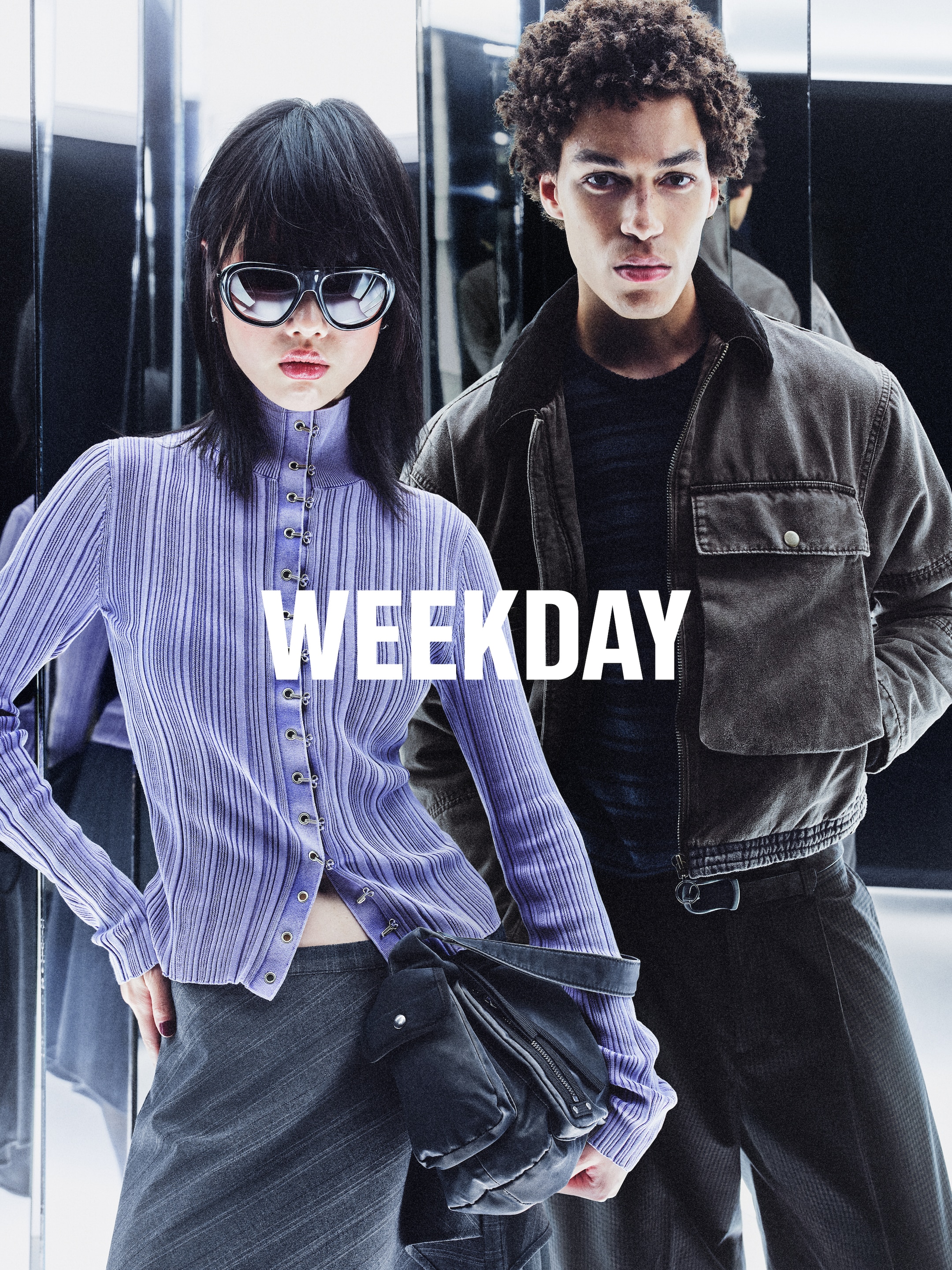 A woman and a man wearing outfits from Weekday collection