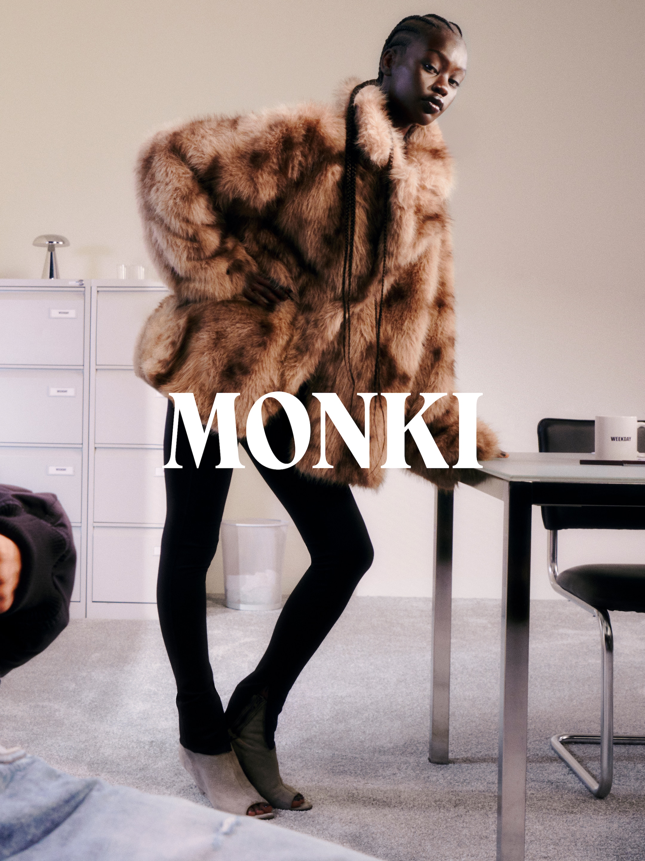 A woman wearing an outfit from Monki collection