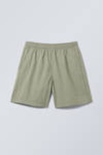 Hellstaubiges Khaki - Badeshorts - 0