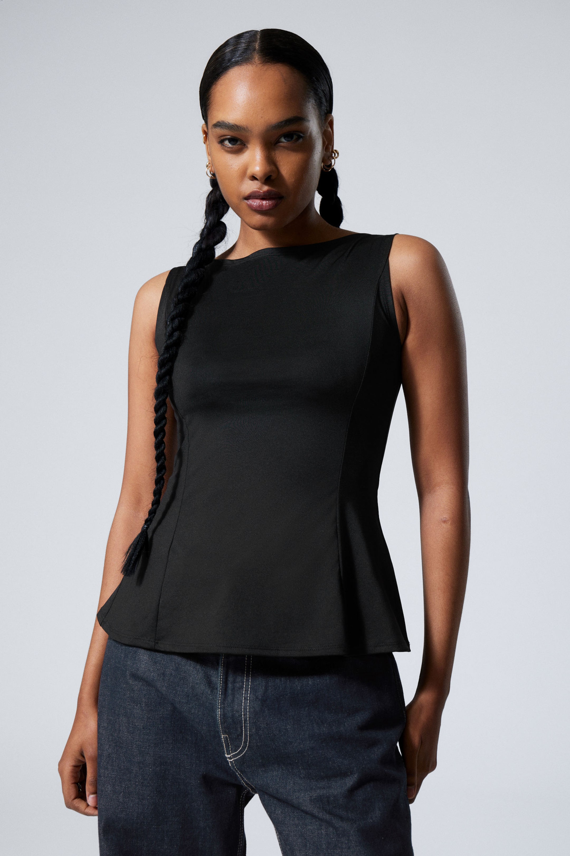 sleeveless asymmetric peplum top Black Weekday EU