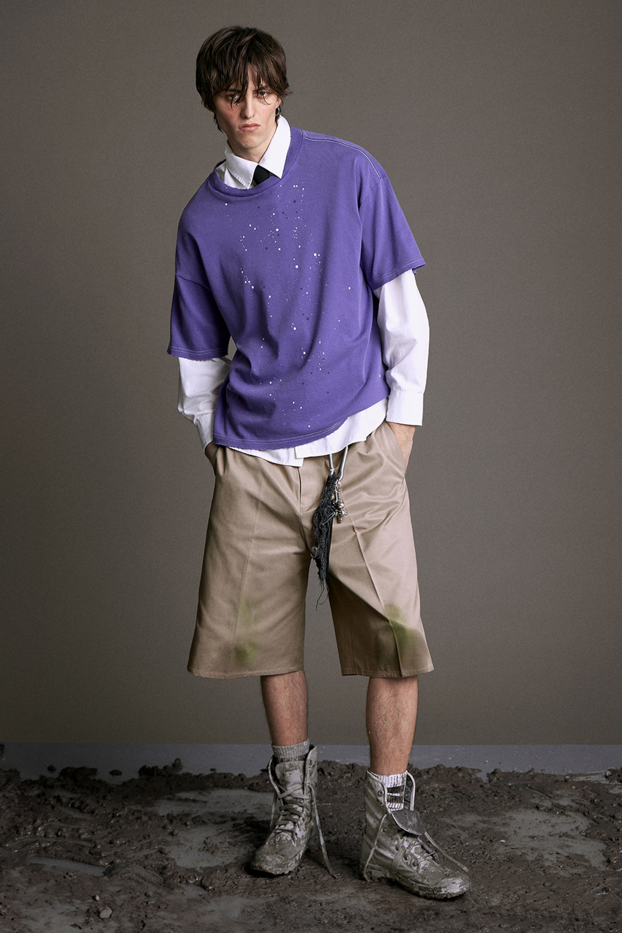 A man wearing an outfit from the Weekday 2025 collection