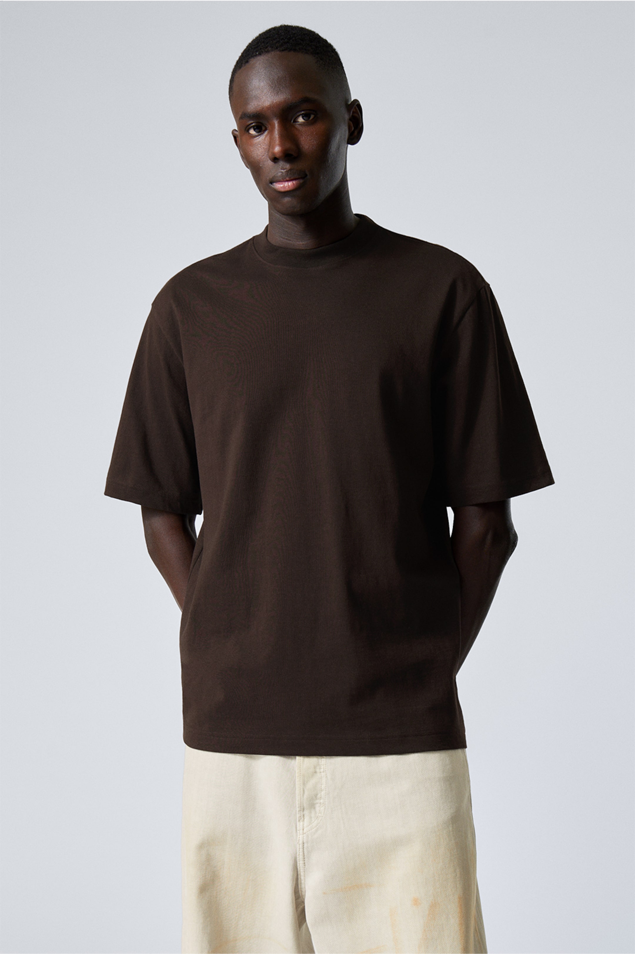 A model wearing clothing from the Weekday 2025 collection