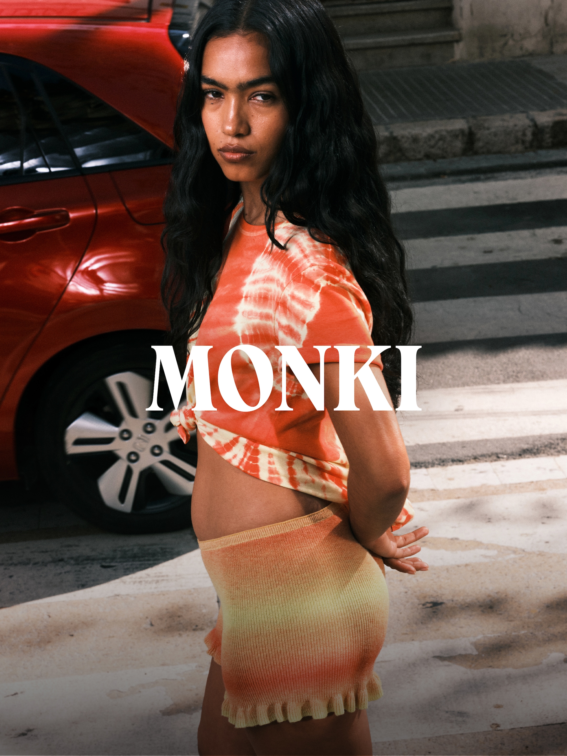 A woman wearing an outfit from Monki collection